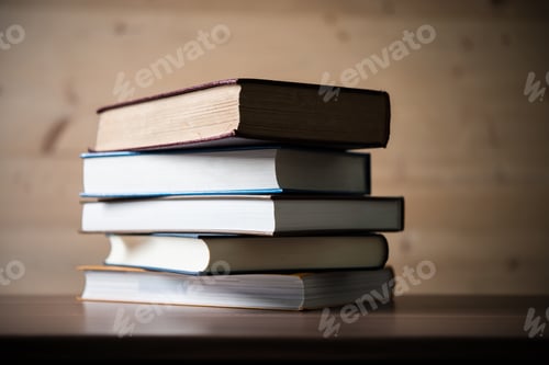 Preview: Stack of books on wooden table. Education concept.