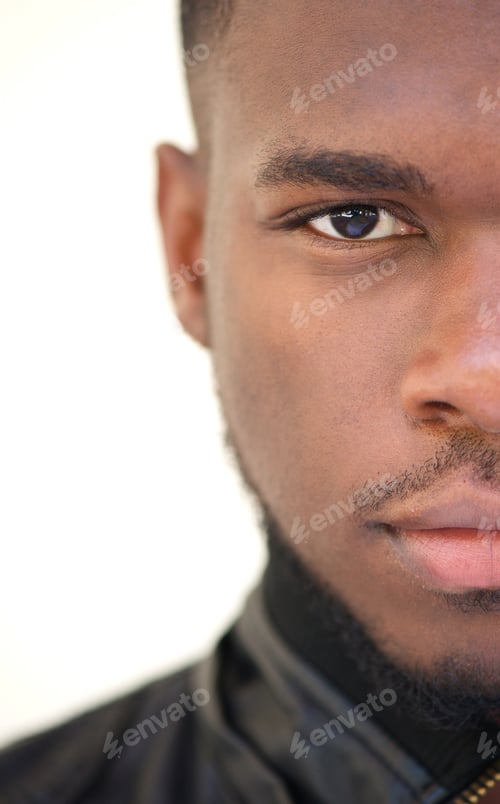 Preview: Half face of a handsome african american man