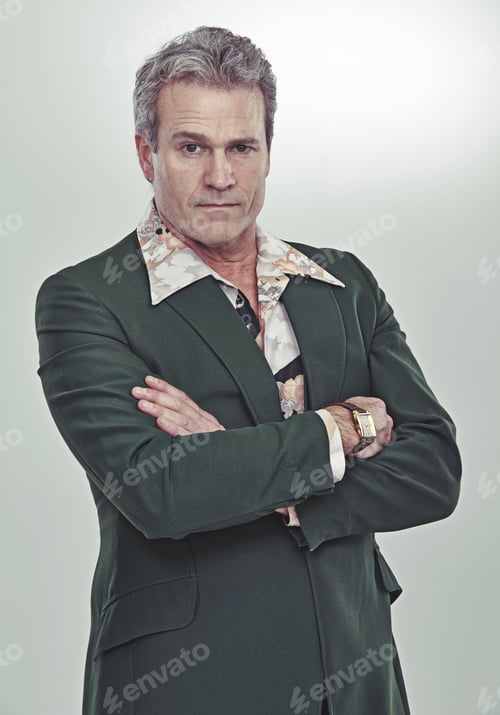 Preview: Like a boss. Cropped studio portrait of a mature man in a retro suit striking a confident pose.