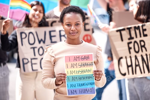 Preview: We all have to care for one another. Shot of a group of young people protesting for LGBTQ rights.