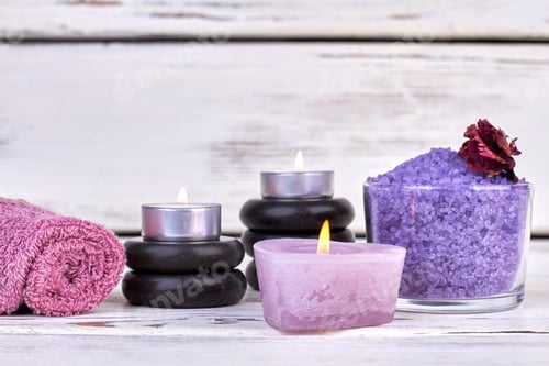 Preview: Set of accessories for spa treatment on white wooden background.