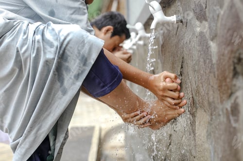 Preview: Muslim people taking ablution