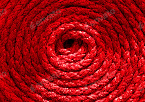 Preview: Heavy-duty bright red coiled ships rope looking from above. Round shapes for concept & copy space.