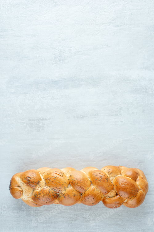 Preview: White braided bread on stone background
