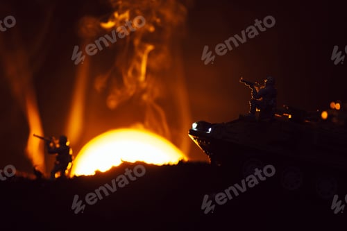 Preview: Battle scene with toy warriors and tank in smoke with sunset at background