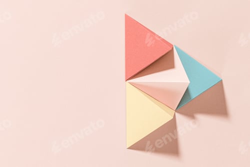 Preview: 3D pastel pyramid paper craft on a pink background