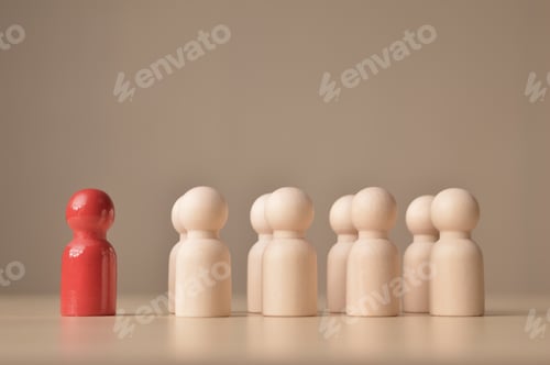 Preview: Red wooden doll figure standing in front of the group