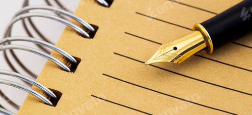 Preview: Vintage old gold fountain pen on a paper sheet, grafology concept