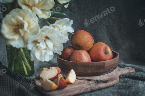 Preview: still life flowers in a vase tulips and red apples on a plate