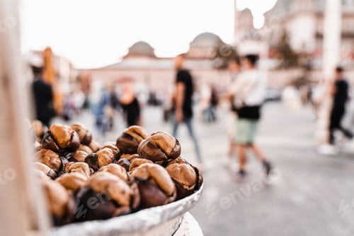 Preview: Roasted chestnuts on pan, local street snack in market