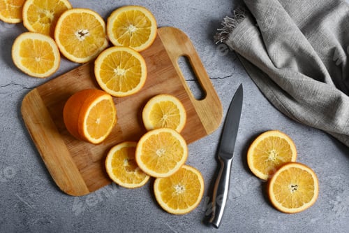 Preview: Sliced oranges on a cutting board