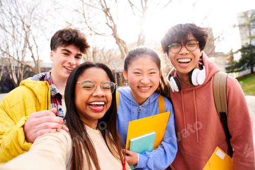 Preview: Group of multi-ethnic high school students taking a selfie. They are outdoors at the campus