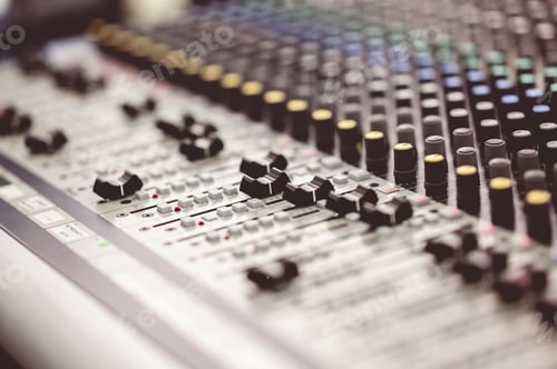Preview: Selective focus shot of a mixing board