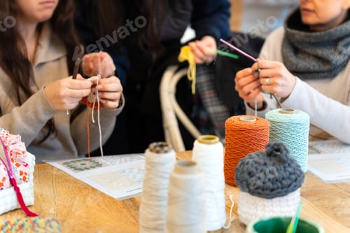 Preview: Women knitting and crocheting during a creative workshop