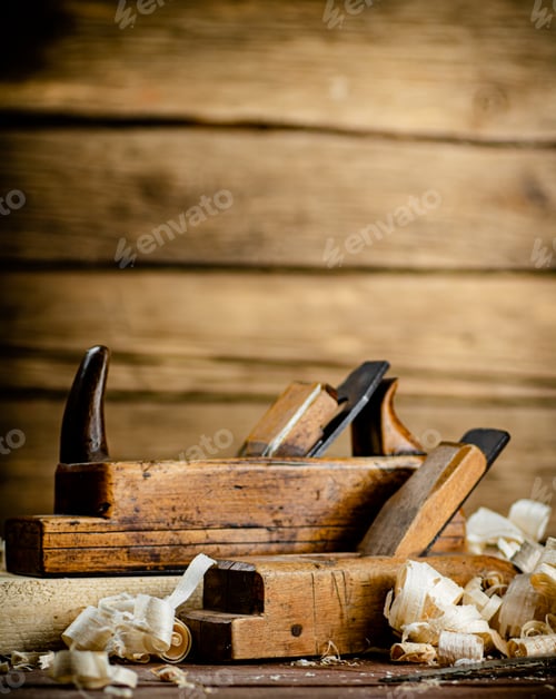 Preview: Working tool. Planer with wooden shavings.