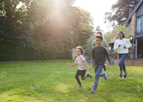 Preview: Family running on lawn outside house