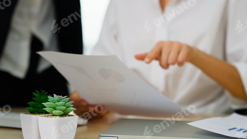 Preview: Business officer brainstorming and talking in office
