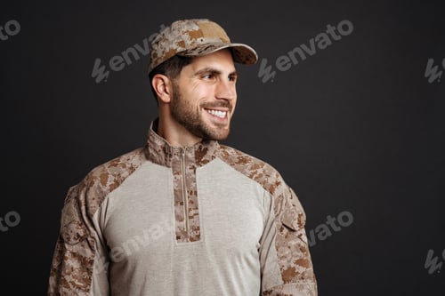 Preview: Happy masculine soldier man military and looking aside