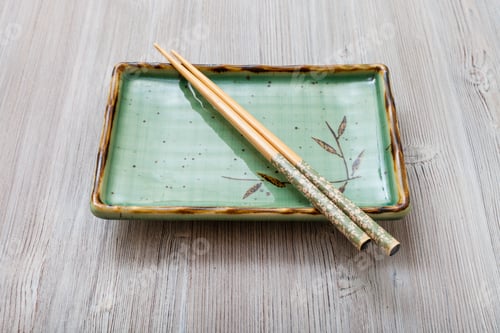 Preview: square plate with chopsticks on gray table
