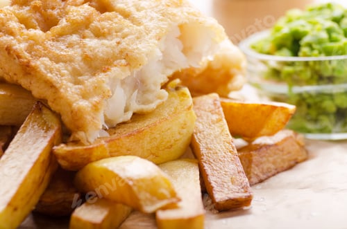 Preview: Traditional British street food fish and chips with mushy peas o