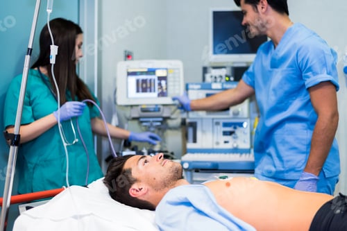 Preview: Doctors preparing patient in hospital