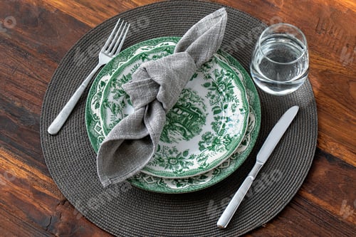 Preview: Table setting. Decorated table. Glass of water. Dinner Bowls and Plates