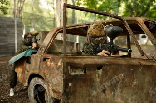 Preview: Warriors shooting with paintball guns, team game