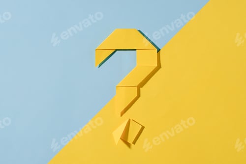 Preview: Yellow origami question mark on a diagonal two tone background