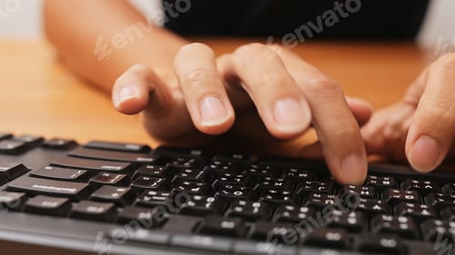 Preview: Working on laptop computer