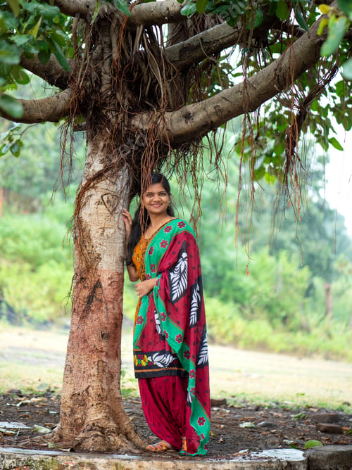 Preview: Happy young beautiful Indian woman at the park outdoor