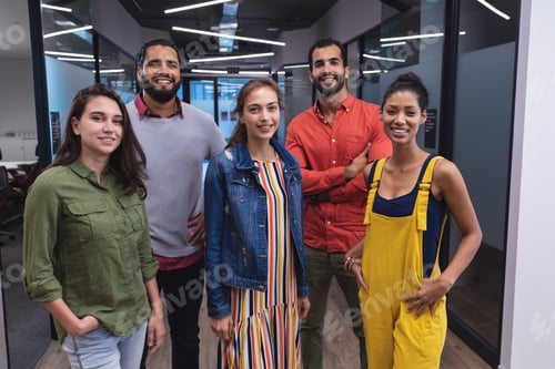 Preview: Portrait of diverse group of creative colleagues looking at camera and smiling