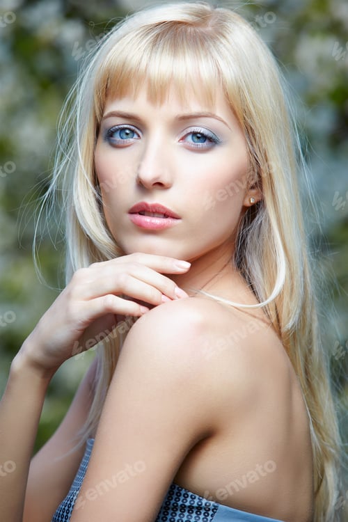 Preview: Outdoor Portrait Of Beautiful Blue-Eyed Blonde Girl Posing