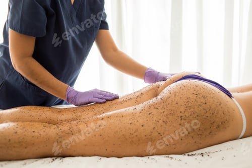 Preview: Woman getting a whole-body relaxing scrub massage done in a spa