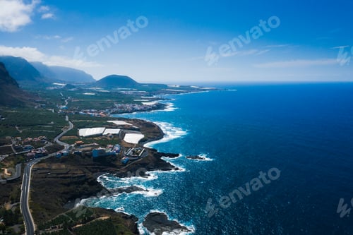 Preview: Rocky cliff and road along the island of Tenerife, Canary Islands, Spain.Bird's eye view of the