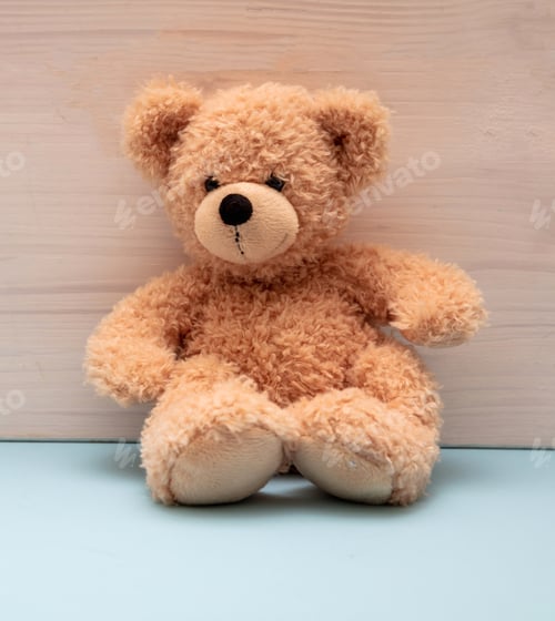 Preview: Teddy bear sitting on blue floor, child room