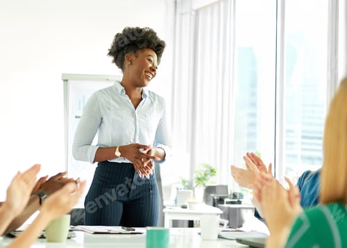 Preview: Young people having a meeting in the office
