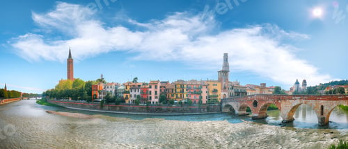 Preview: Amazing Verona cityscape view on the riverside with historical buildings and towers.
