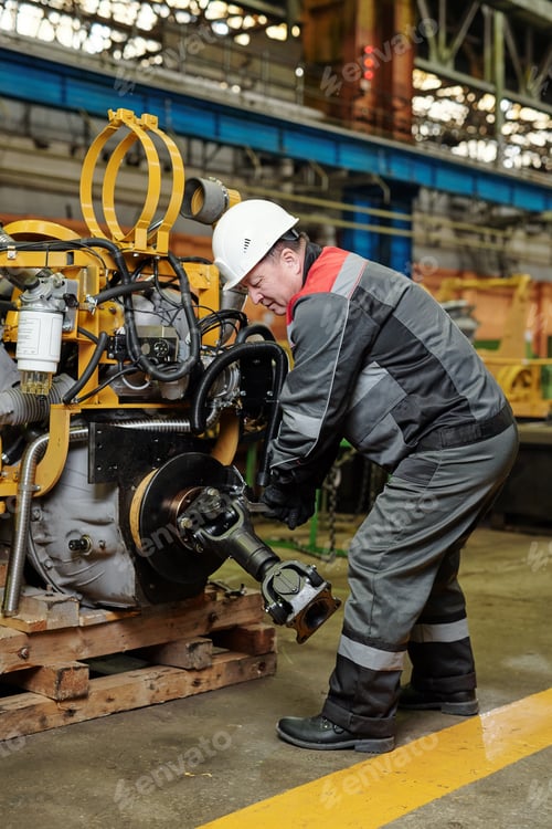 Preview: Engineer working with metal equipment