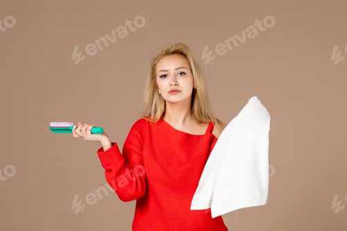 Preview: front view young female with towel and hairbrush on dark pink background mask woman skincare cream