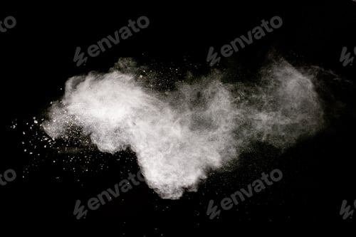 Preview: White powder explosion cloud against black background.White dust particle splash.