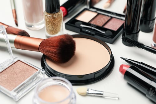 Preview: Different makeup cosmetics on white background, top view