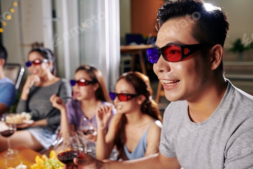 Preview: Man watching movie with friends