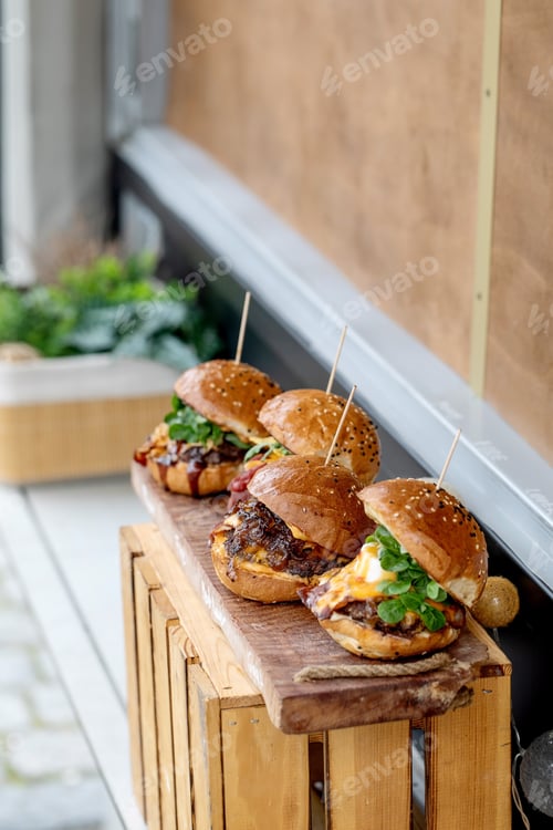 Preview: Delicious Gourmet Burgers on Wooden Serving Board