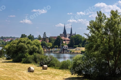 Preview: Bad Wimpfen, old shipping pier for dangerous goods on the Neckar with field and church in autumn