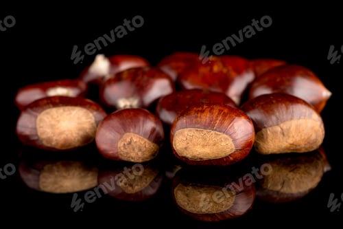 Preview: Chestnuts on a black reflective background