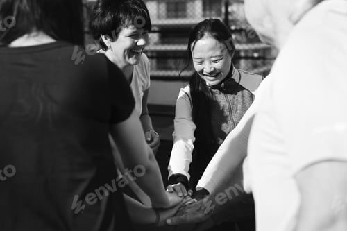 Preview: People exercising at fitness gym