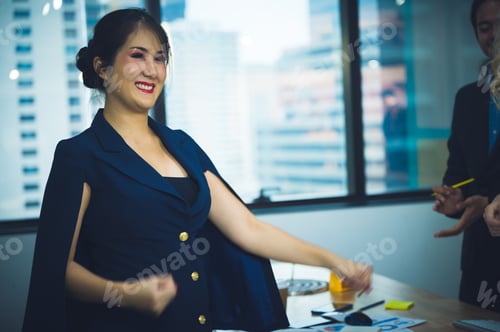 Preview: A business woman present the project idea to worker colleague at the office