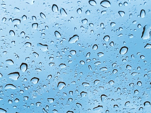 Preview: Water droplets on the glass on a natural background