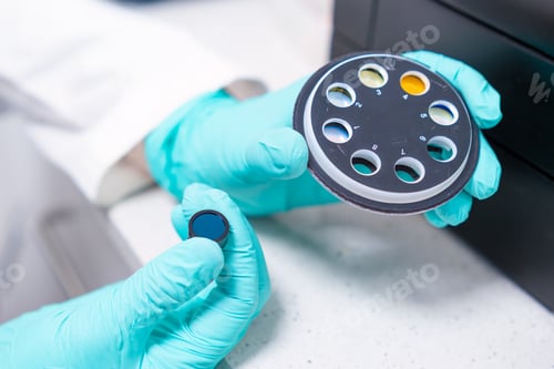 Preview: The scientist changes UV filters intended for microbiological analysis using a spectrophotometer