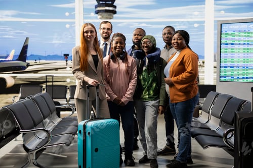 Preview: Portrait diverse travelers waiting at departures lounge in busy airport terminal